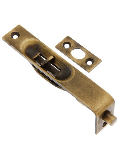 4 inch Flush Mounted Door Bolt in Antique Brass.